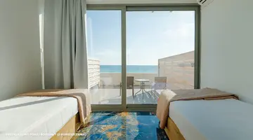 Hotel Ninos Grand Beach Resort