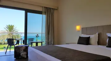 Natura Beach Hotel & Villas