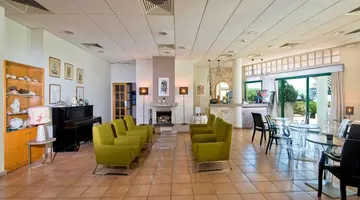 Natura Beach Hotel & Villas