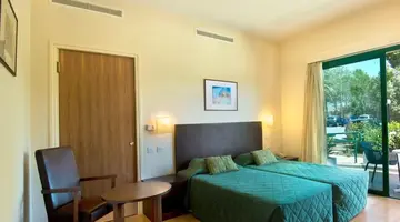 Natura Beach Hotel & Villas