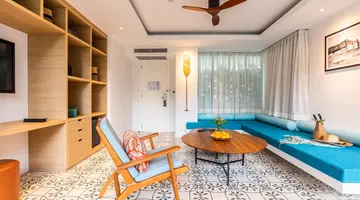 Outrigger Surin Beach Resort