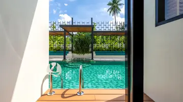 Outrigger Surin Beach Resort