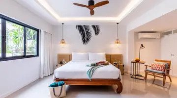 Outrigger Surin Beach Resort