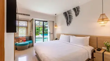 Outrigger Surin Beach Resort