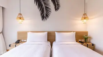 Outrigger Surin Beach Resort