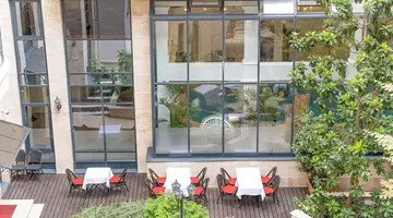 Queen s Court Hotel and Residence