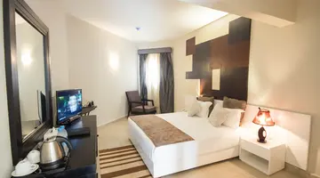 SHARMING INN HOTEL