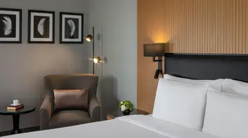 THE FIRST COLLECTION BUSINESS BAY