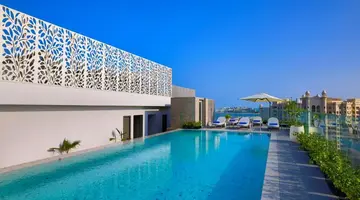 Tumbi West Palm Beach Hotel Dubai, Tapestry Collection by Hilton