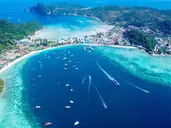 Wieżowce Singapuru i plaże Tajlandii